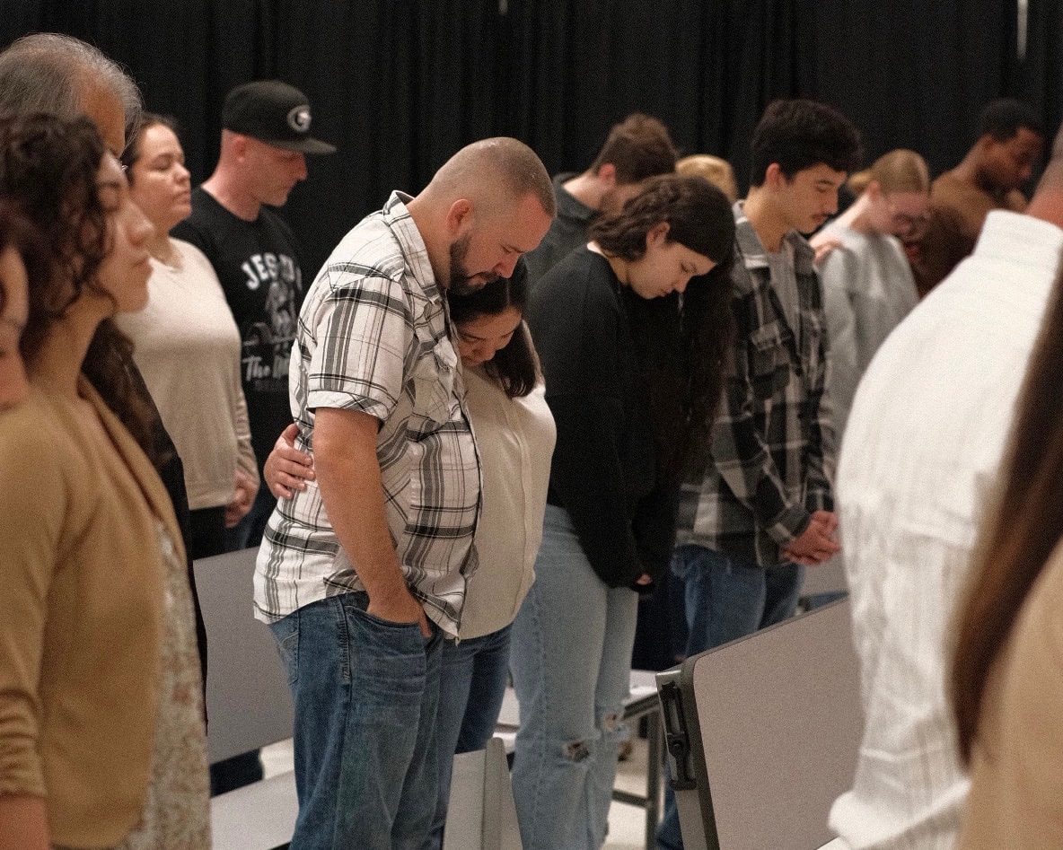 Congregation praying together