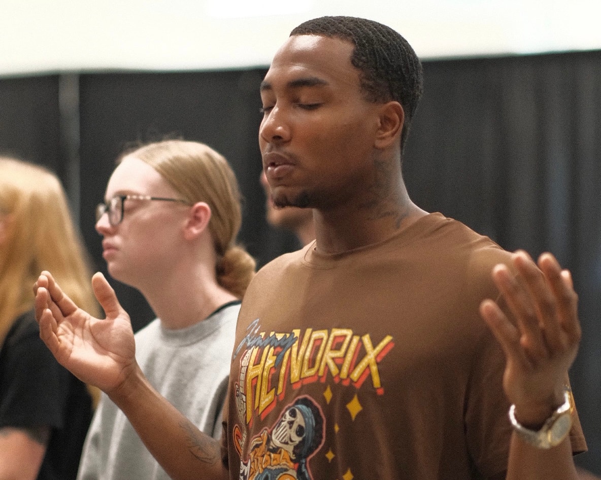 Worshipper with hands raised