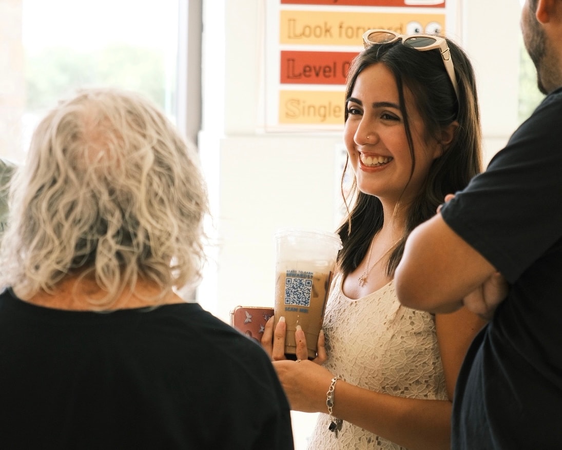 Smiling woman connecting with others