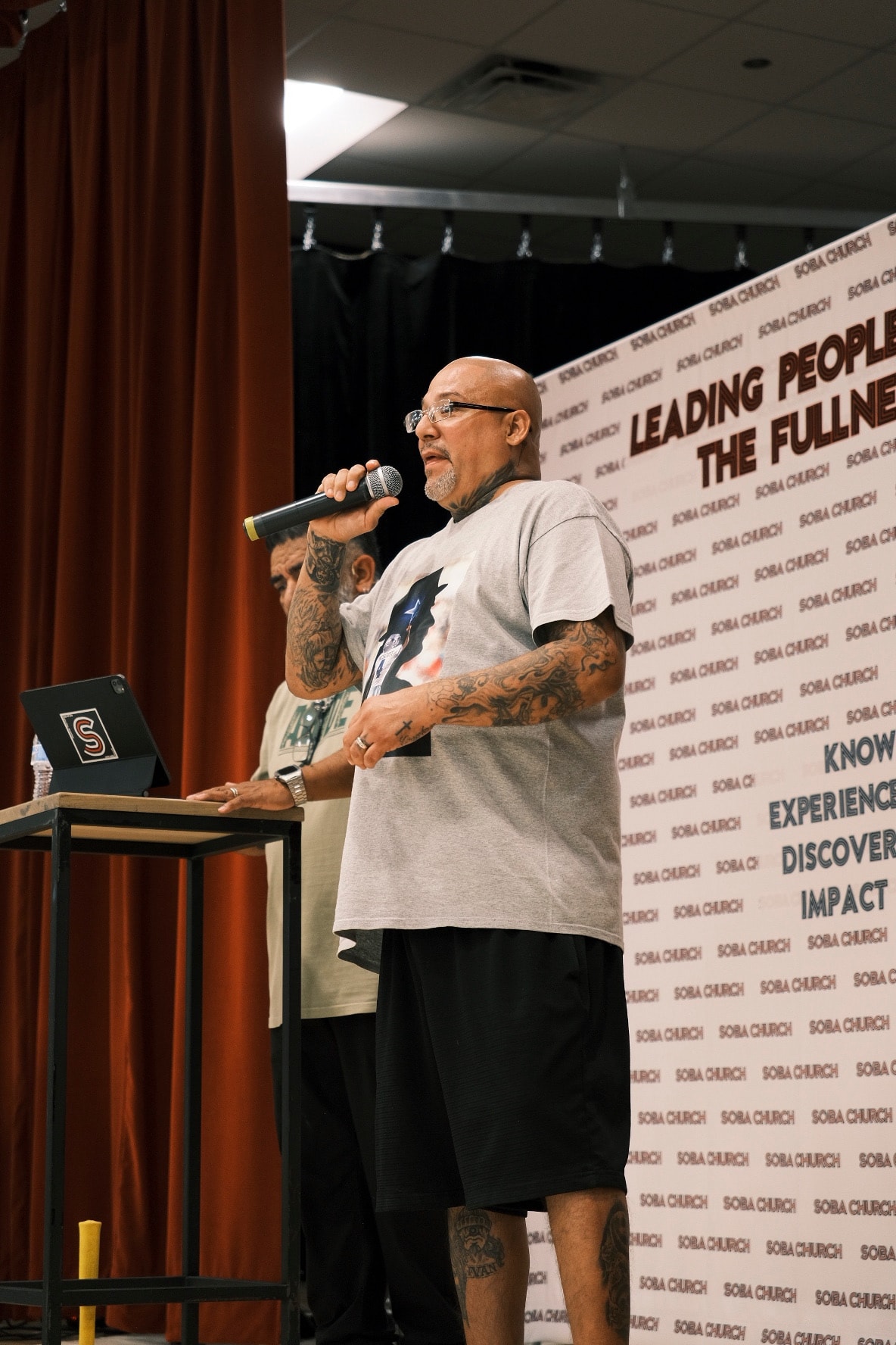 Pastor speaking at Soba Church event